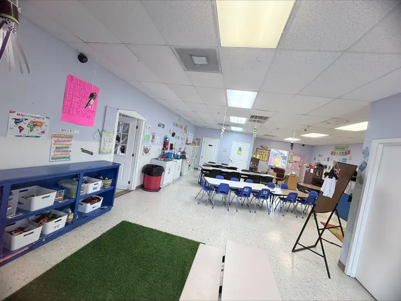 After-school classroom with tables and chairs ready for homework time